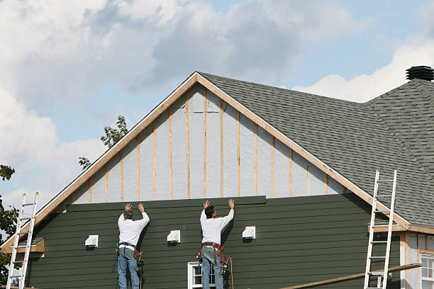 Professional Siding technician working in Dobson, NC
